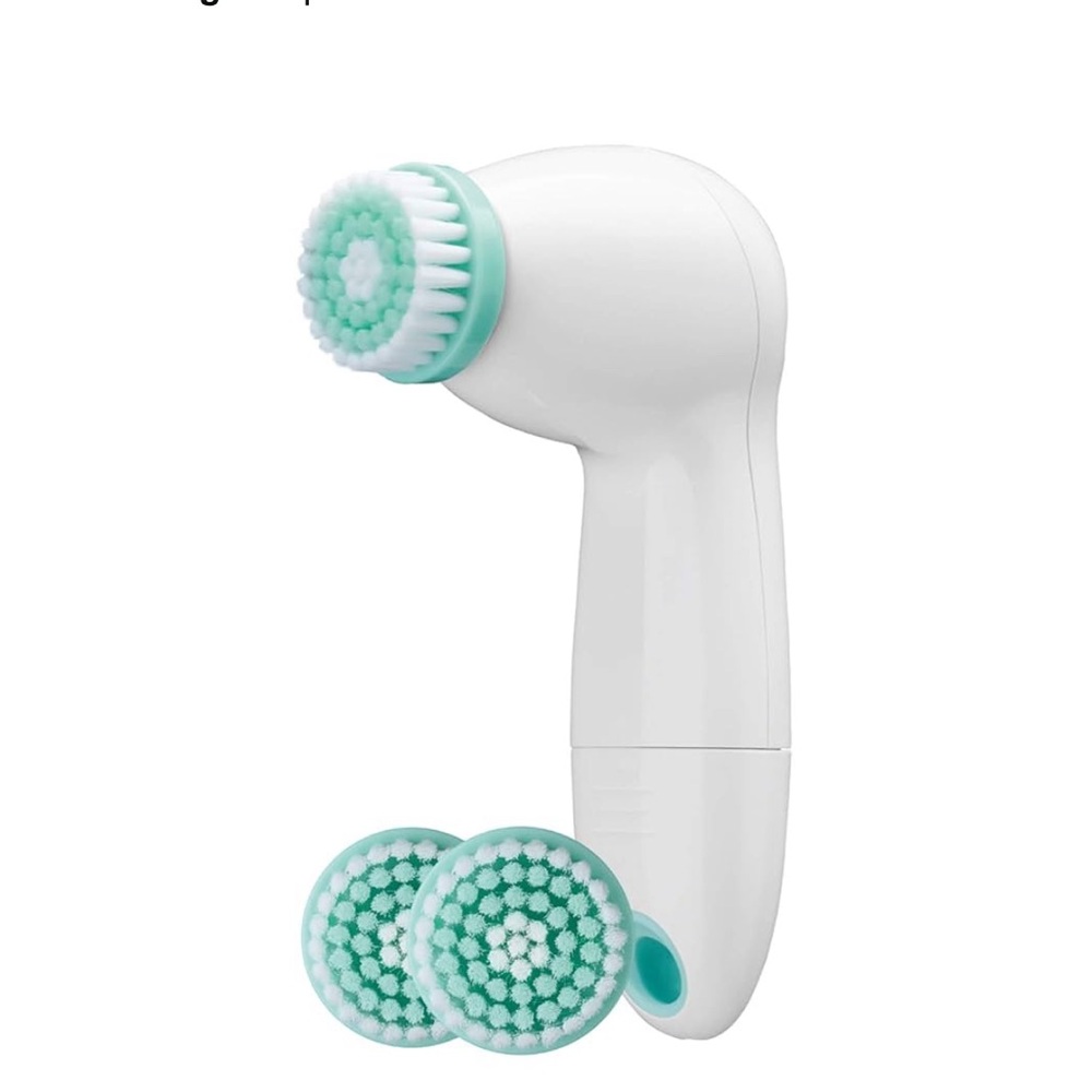 White and Mint Facial Cleansing Brush.